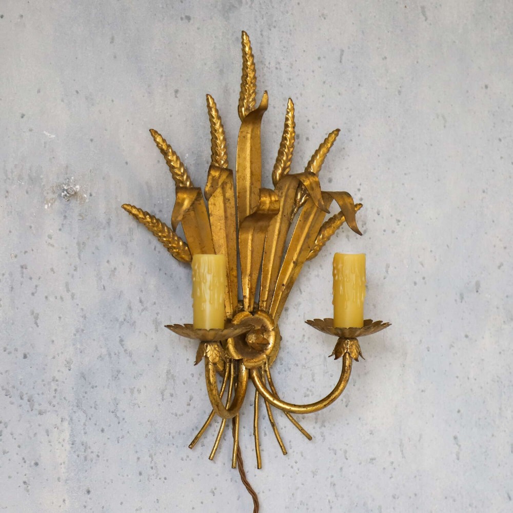 A mid-century gilt metal wall sconce crafted in the form of a wheat sheaf with two candle arms. View IX