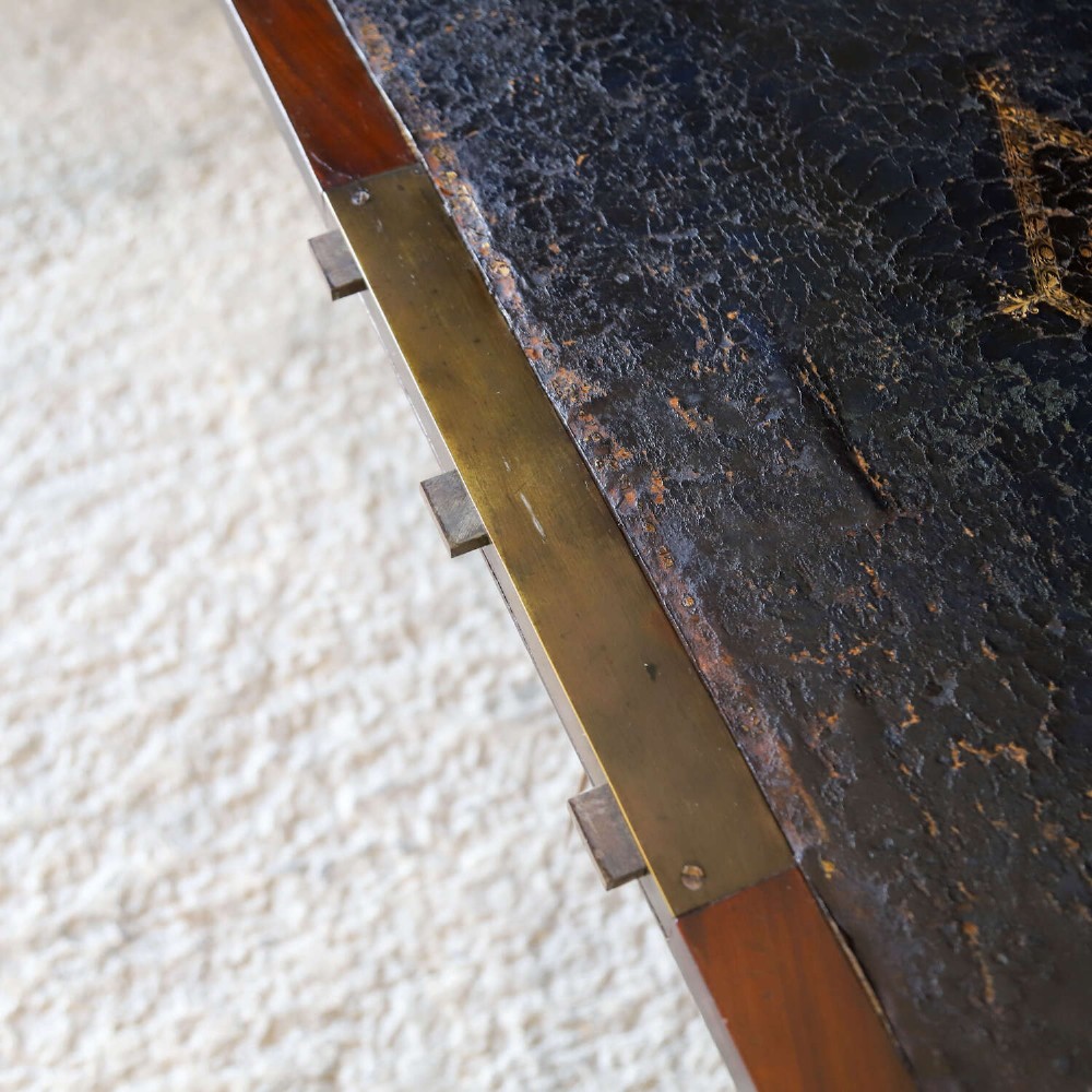 A 19th-century French secretaire a abattant featuring flame mahogany veneers, a dark marble top slab, an upper drop-front writing panel, and lower cupboard doors. View III