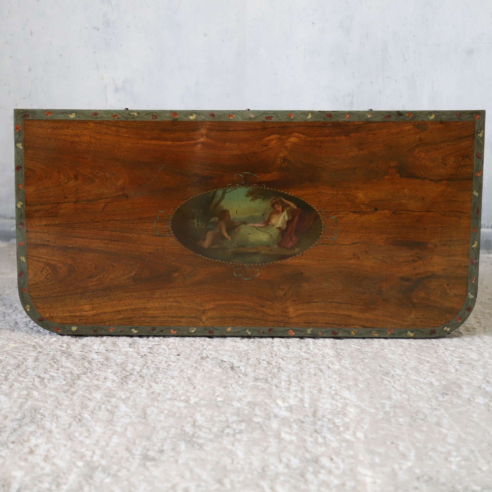 A Regency rosewood card table with a fold-over top, tapered legs, and hand-painted floral garland decoration along the apron. View VIII