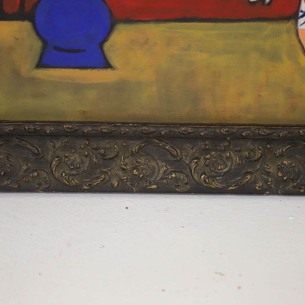 A 1930s Swedish still life oil painting depicting white tulips in a patterned ceramic vase next to a blue jug on a red background, set inside a carved dark wooden frame. View V