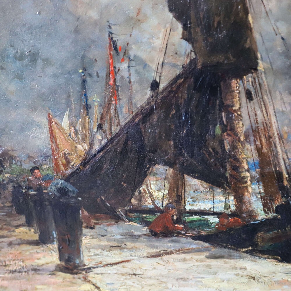 A 19th-century framed oil painting on canvas depicting sailboats moored along a harbour quay under a cloudy sky. View IV