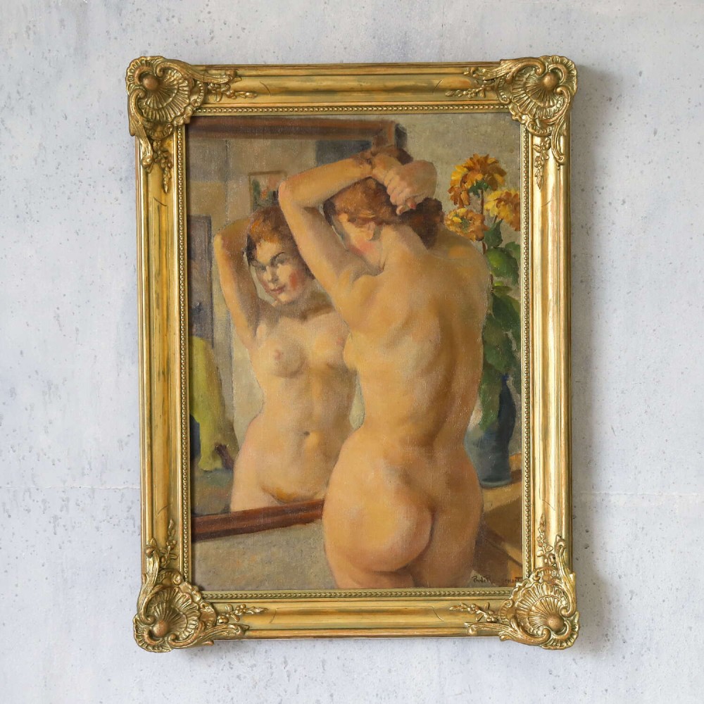 An oil painting on canvas depicting a female nude positioned before a mirror, presented inside an ornate gilded frame. View II