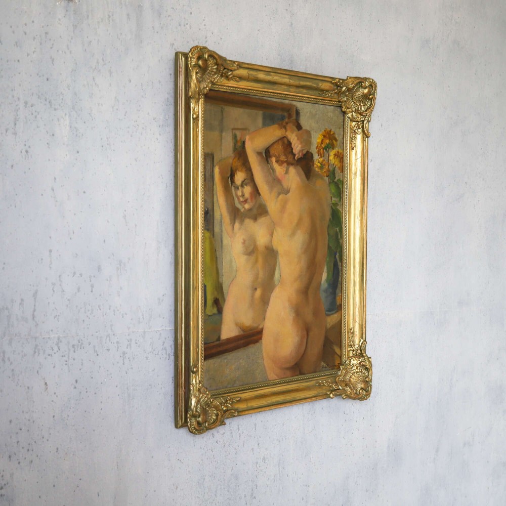 An oil painting on canvas depicting a female nude positioned before a mirror, presented inside an ornate gilded frame. View VIII