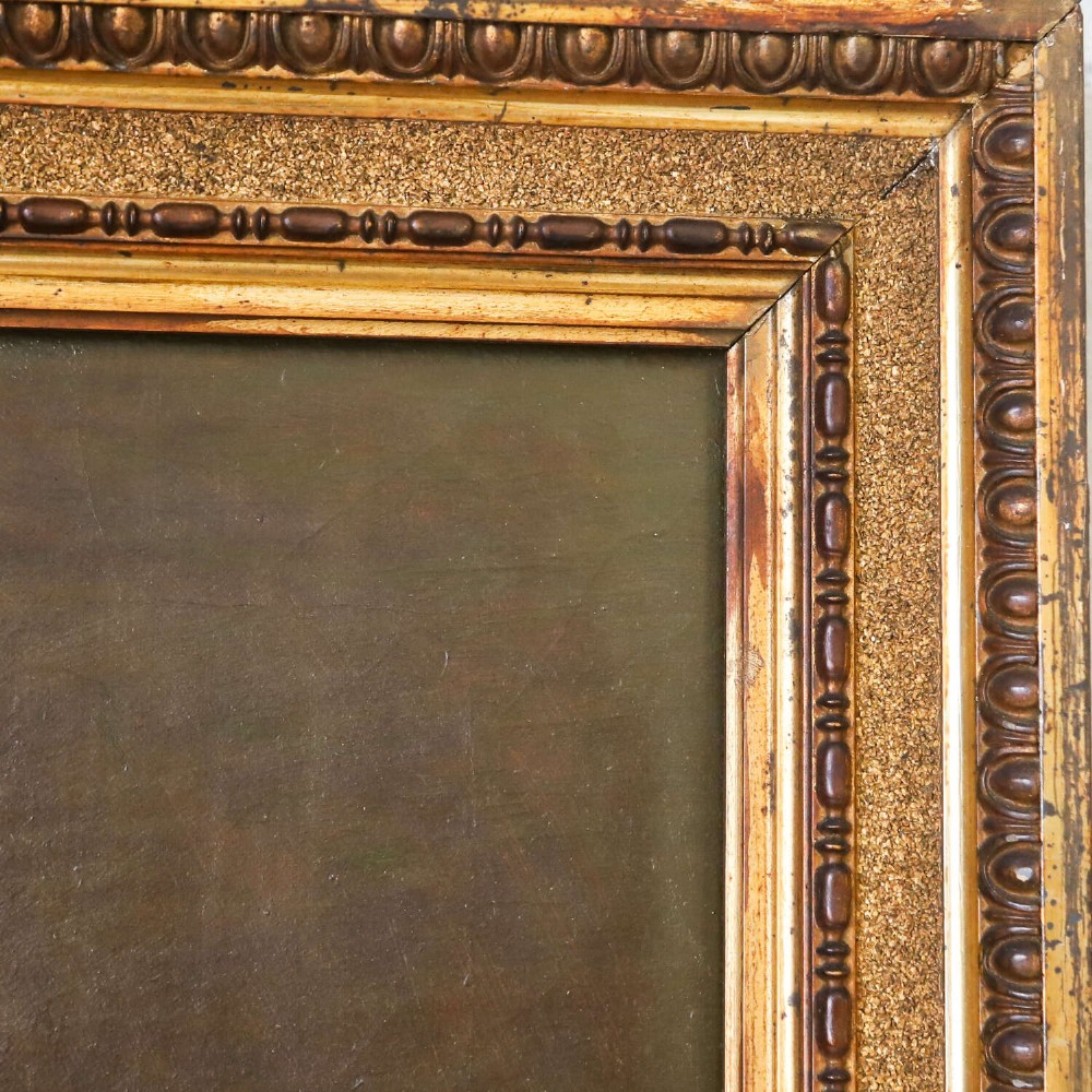 An antique oil painting depicting a male subject wearing a patterned waistcoat and black jacket, set in a gilded frame. View V