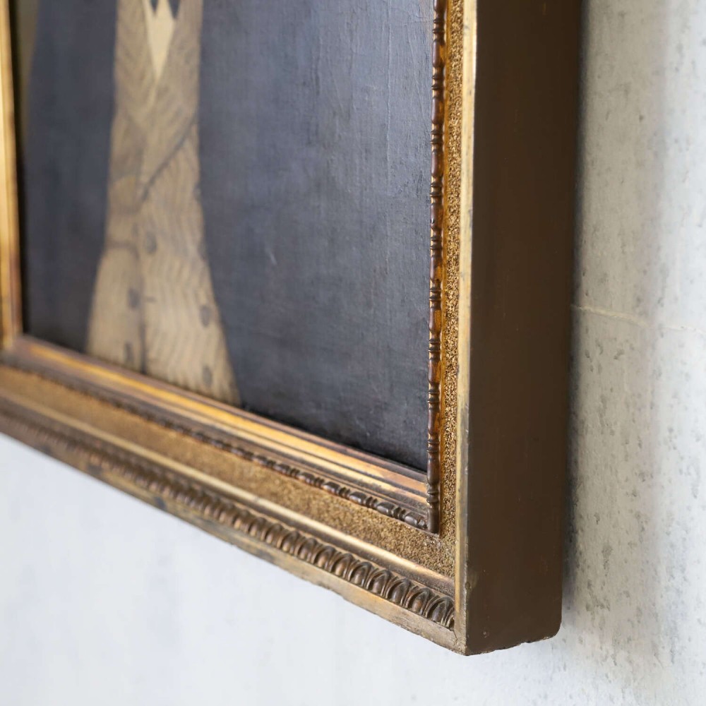 An antique oil painting depicting a male subject wearing a patterned waistcoat and black jacket, set in a gilded frame. View IX