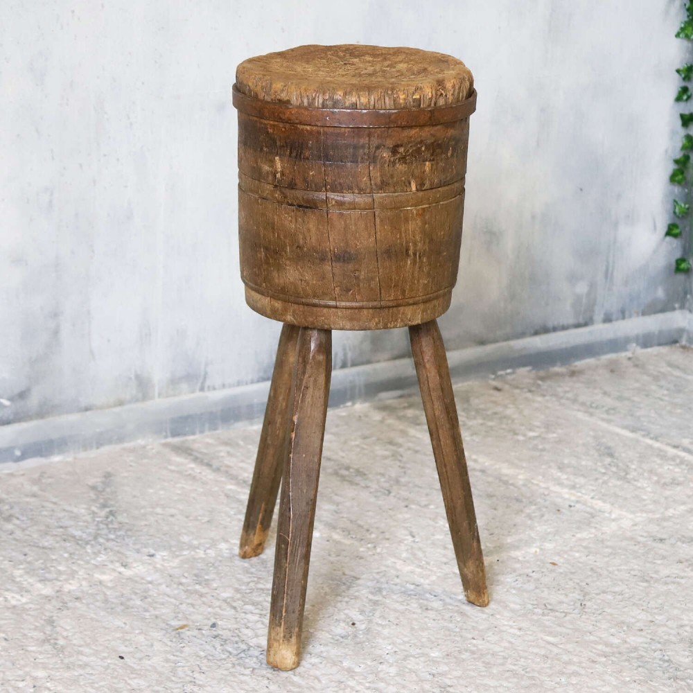 A rustic three-legged French chopping block made from oak and elm with a textured wooden top. View IV