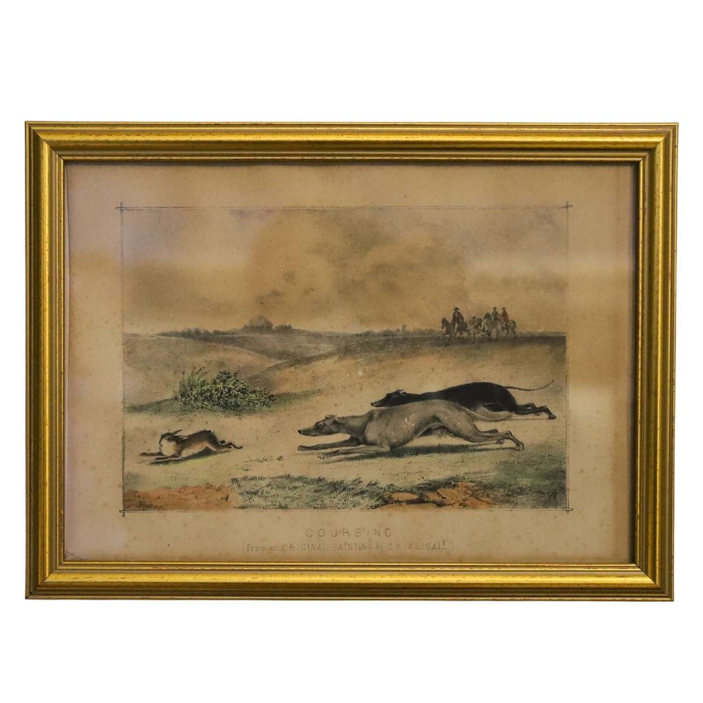An 1830s framed lithograph depicting two greyhounds pursuing a hare across a field within a moulded gold frame.