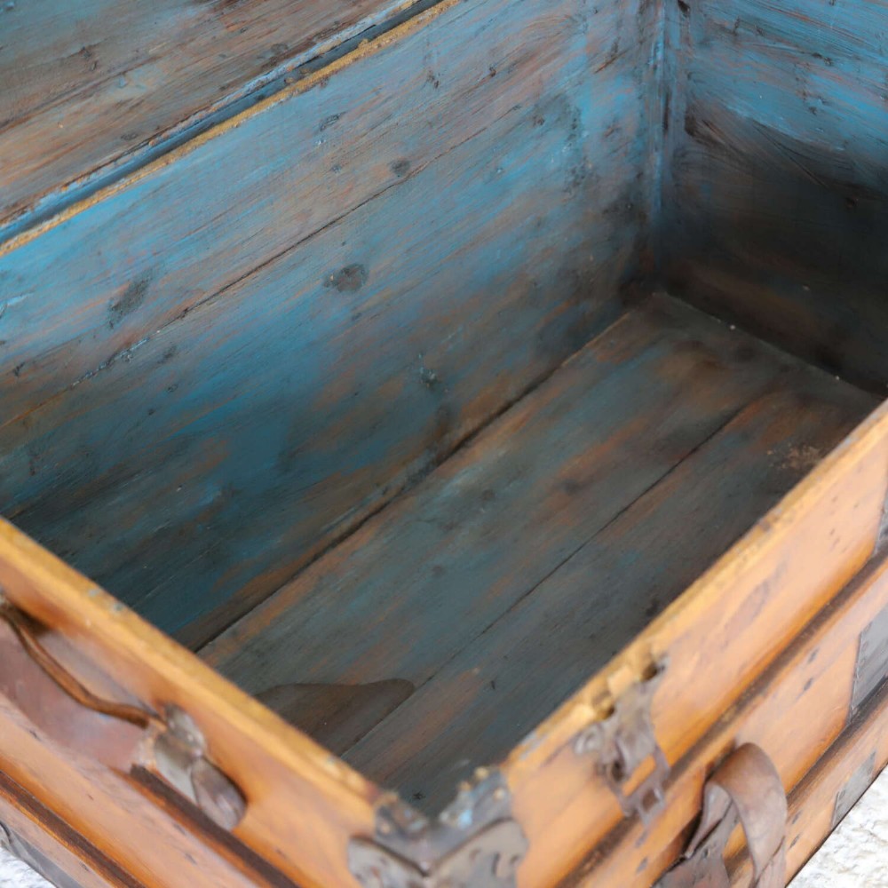 A 19th-century Victorian pine travelling trunk featuring wooden battens, iron corner brackets, central lock plate, and leather securing straps. View X