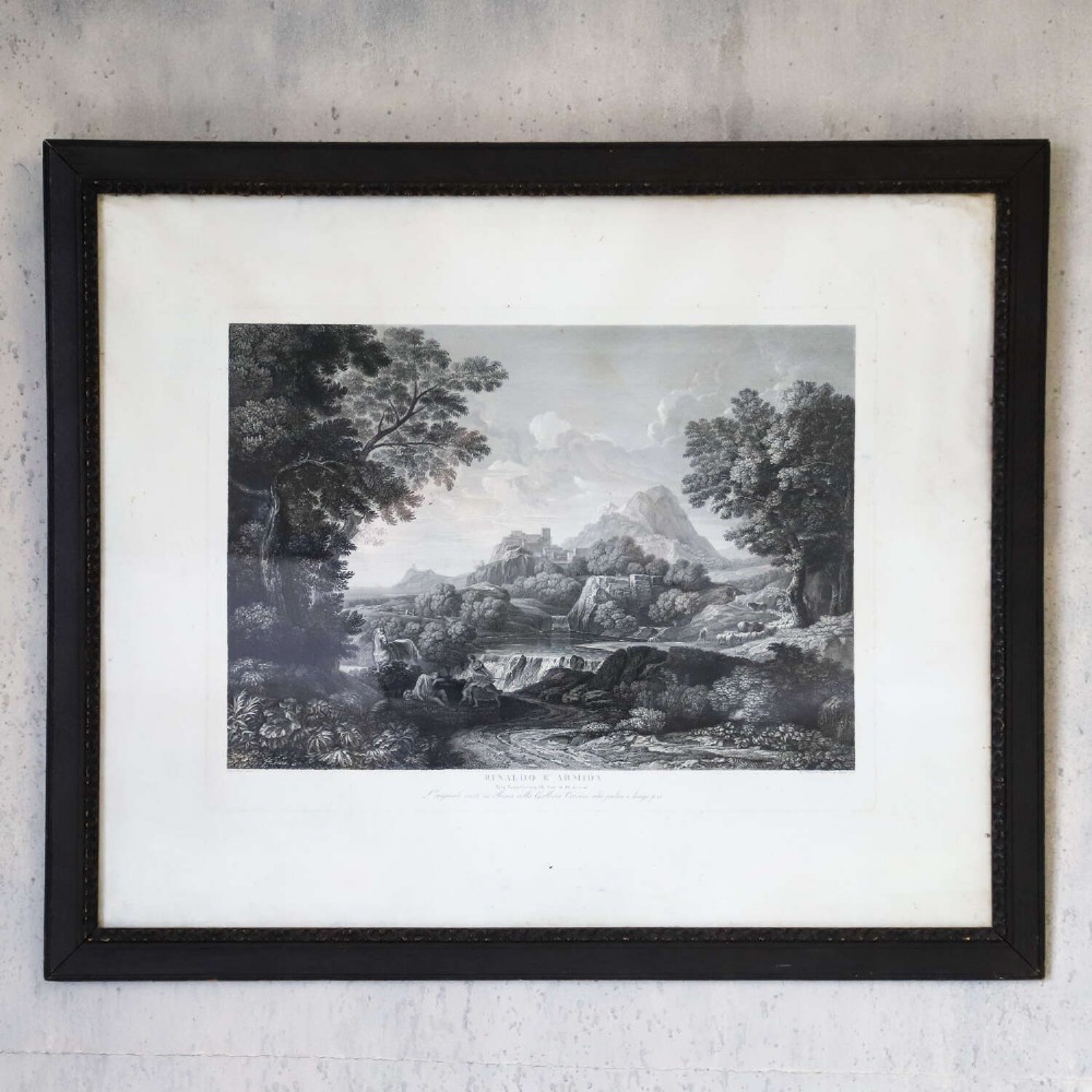 An 18th-century monochrome landscape engraving entitled Rinaldo e Armida, displayed within a wide mount and dark wooden frame. View II
