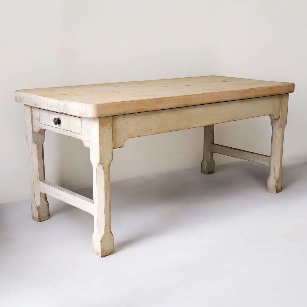 A 19th-century English country house prep table featuring a thick natural timber top, an off-white painted wooden base, a side drawer, and low stretchers. View II