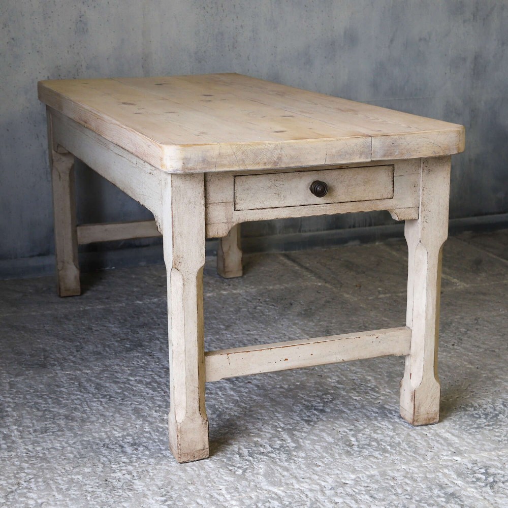 A 19th-century English country house prep table featuring a thick natural timber top, an off-white painted wooden base, a side drawer, and low stretchers. View XIII