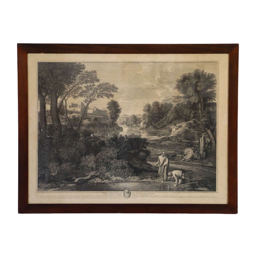 An 18th-century monochrome French engraving depicting a classical landscape with figures beside a body of water, housed in a plain dark wood frame.