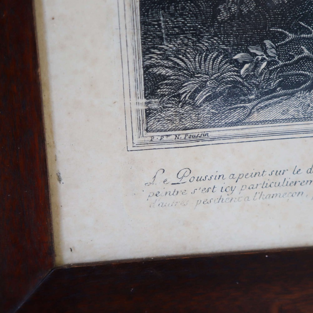An 18th-century monochrome French engraving depicting a classical landscape with figures beside a body of water, housed in a plain dark wood frame. View X