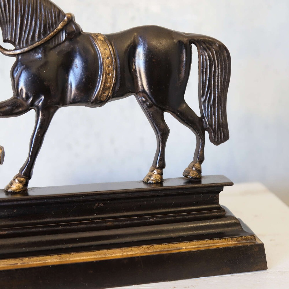 Edwardian horse door stop in cast iron with bronze details View IX