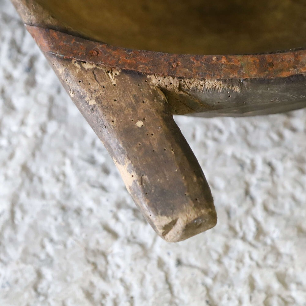 A hand-carved 19th-century French wooden dough trough with integrated handles and a weathered surface. View VII