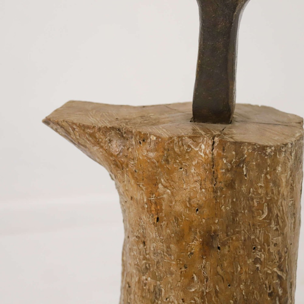 A nineteenth-century T-shaped wrought iron farriers anvil mounted into a natural carved fruitwood log trunk. View IV
