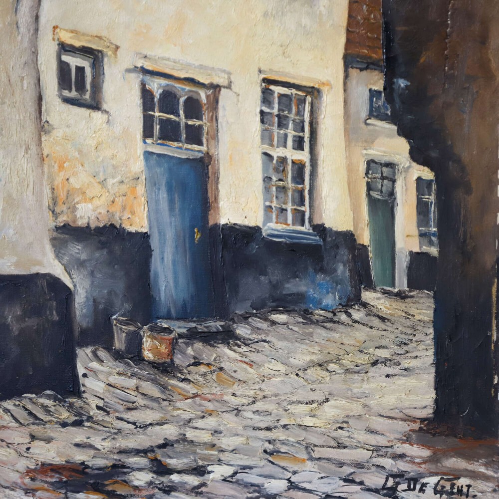 An oil painting on canvas depicting a Flemish cobbled street framed by a dark archway, featuring white plaster buildings and a blue door, signed by L. De Gent. View V