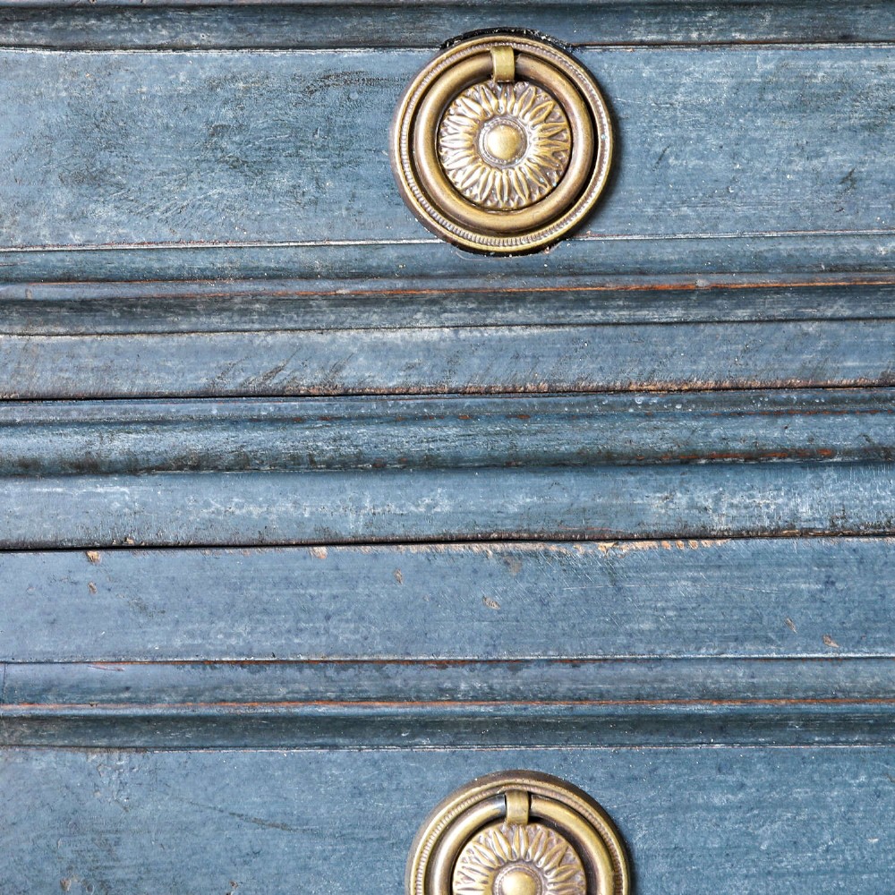 A late 19th-century French Louis XVI Revival chest of drawers painted in slate blue with four drawers featuring decorative brass hardware. View VI