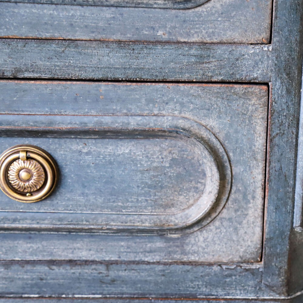 A late 19th-century French Louis XVI Revival chest of drawers painted in slate blue with four drawers featuring decorative brass hardware. View VIII
