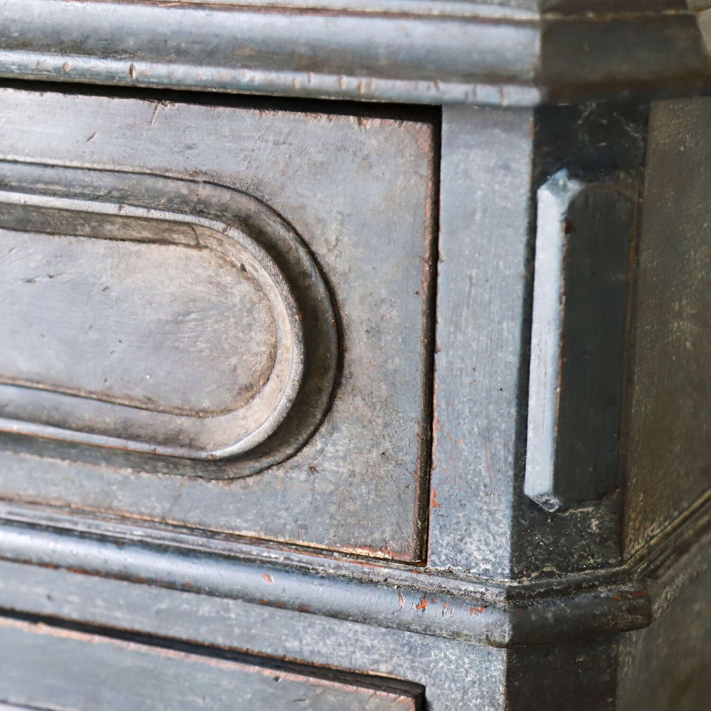 A late 19th-century French Louis XVI Revival chest of drawers painted in slate blue with four drawers featuring decorative brass hardware. View IX