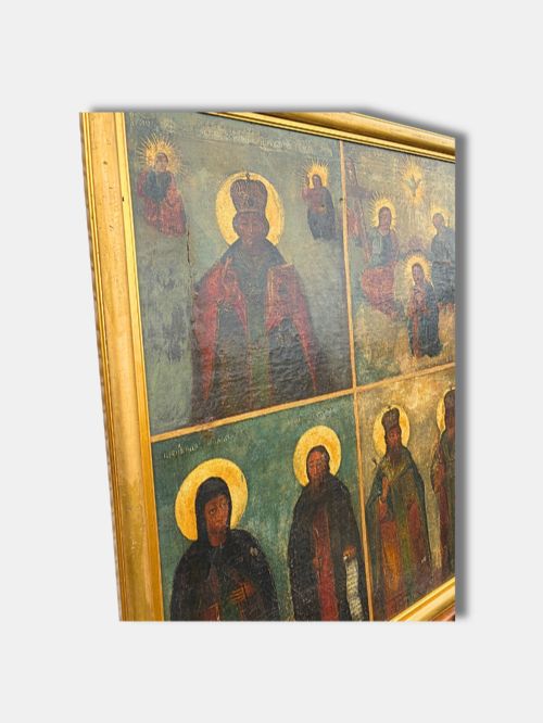 fig 1. An antique Russian quadripartite icon painting featuring four distinct devotional panels framed in a gilded wood border.