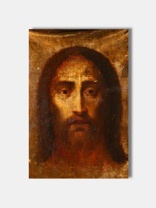 fig 1. A seventeenth-century Spanish oil painting on canvas depicting the Holy Face of Jesus Christ presented on Veronicas draped veil against a dark ground.