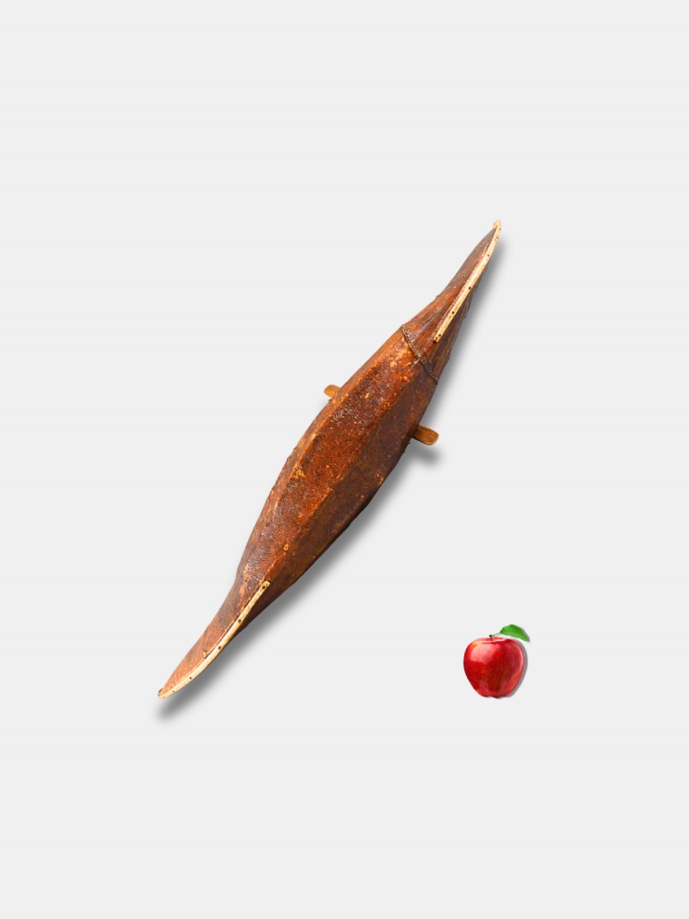 An 1882 Inuit model kayak crafted from tanned seal skin over a frame, featuring a central carved paddler figure holding a paddle, mounted on a modern black display stand. View III