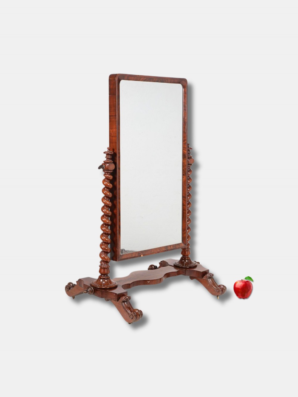 A Victorian warm brown wood cheval mirror featuring barley twist supports, turned finials, and a serpentine plinth base. View II