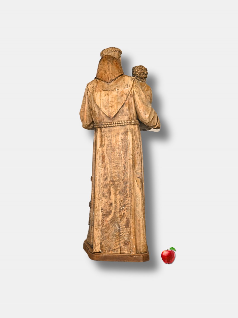 A 19th-century life-size French hand-carved wood sculpture depicting Saint Anthony holding the Christ Child on a plinth. View II