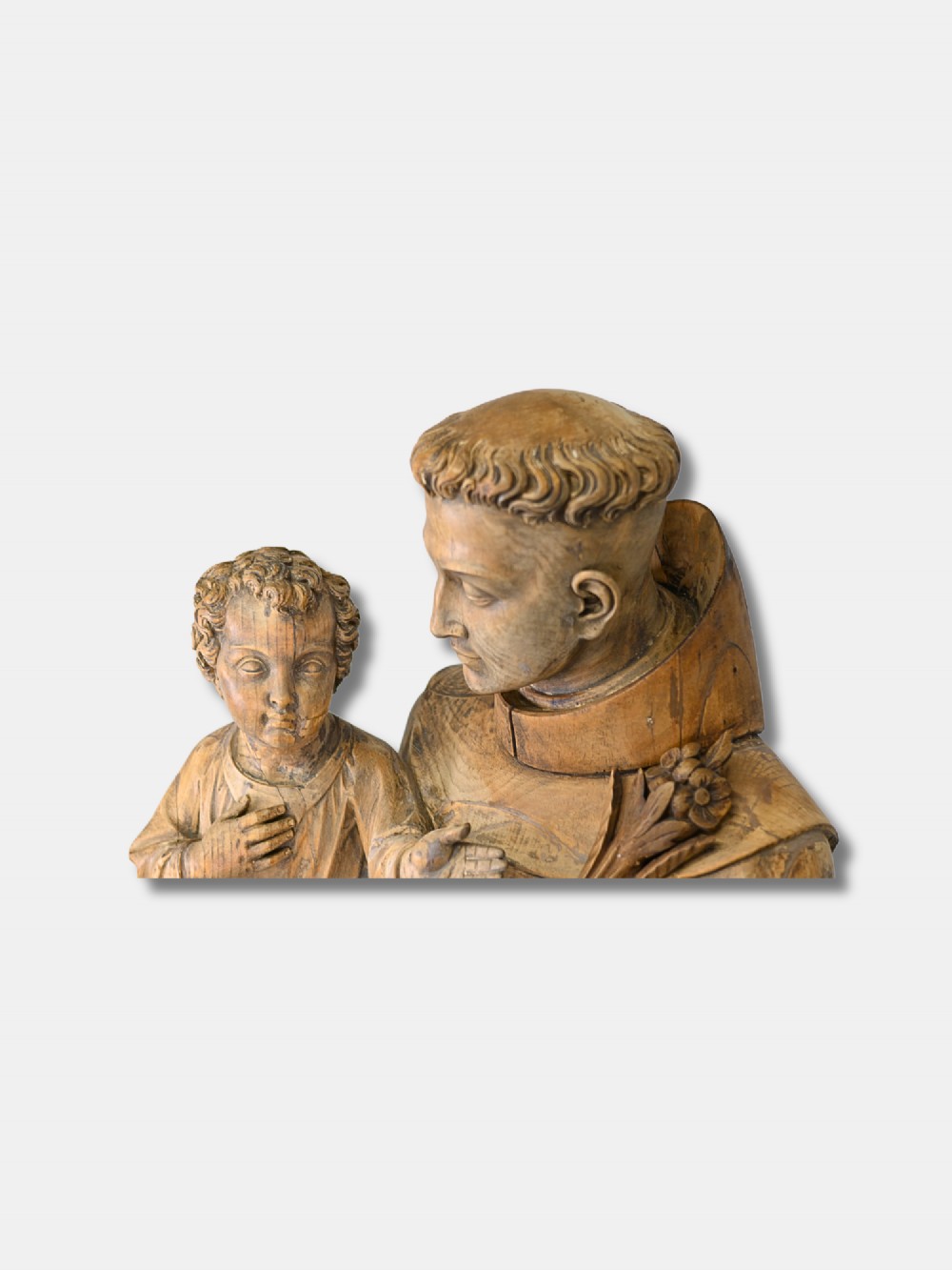 A 19th-century life-size French hand-carved wood sculpture depicting Saint Anthony holding the Christ Child on a plinth. View V