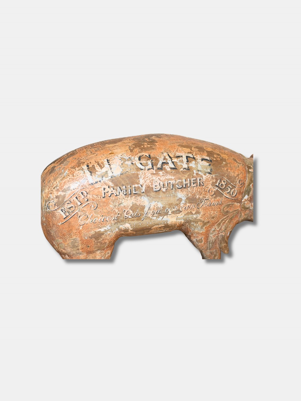 A carved wooden butcher shop trade sign shaped like a pig with a distressed ochre painted finish and white hand-lettered typography. View IV