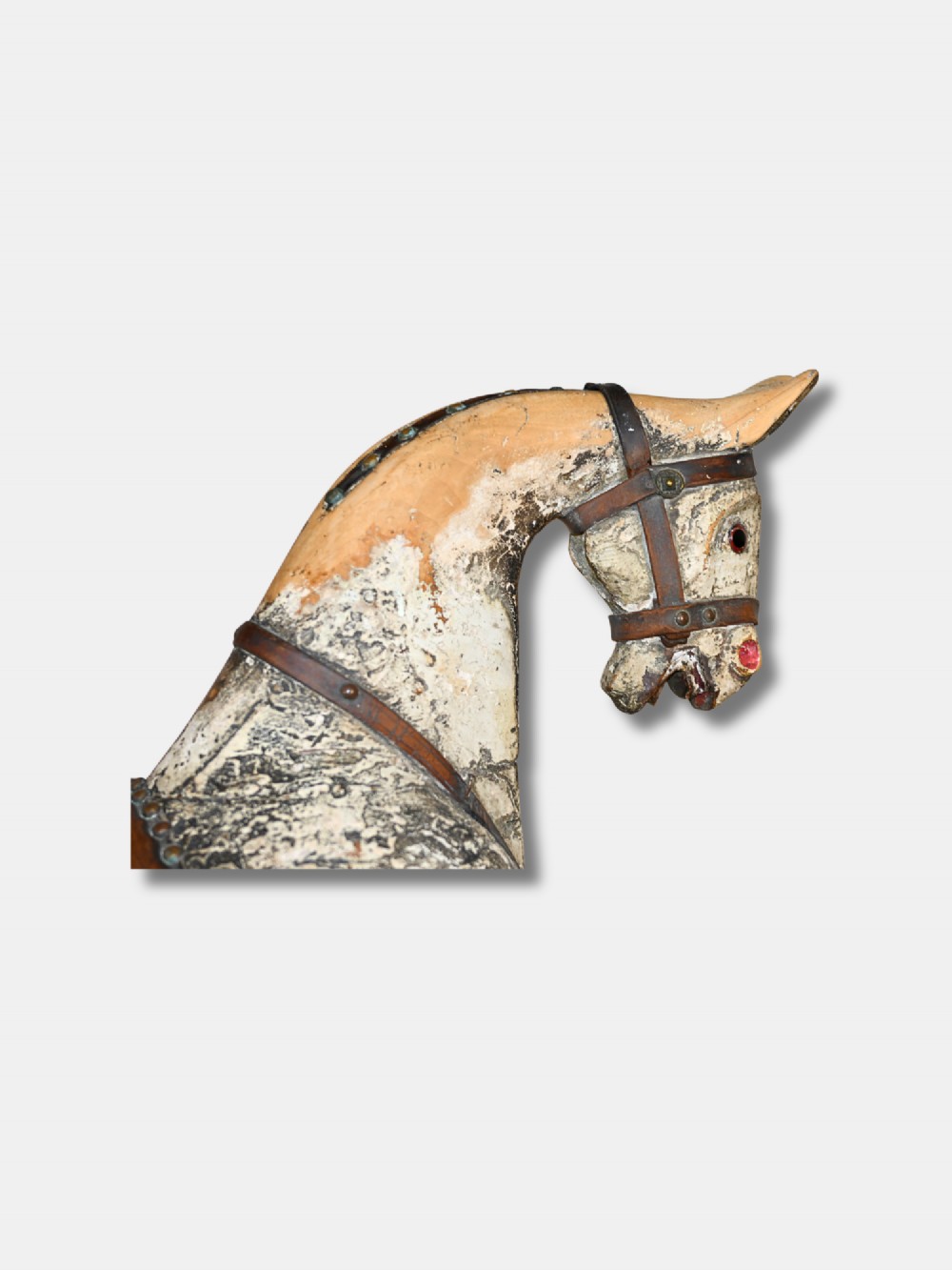 A carved 19th-century wooden rocking horse figure with distressed cream paint and a leather saddle, mounted on a dark metal display stand. View IV