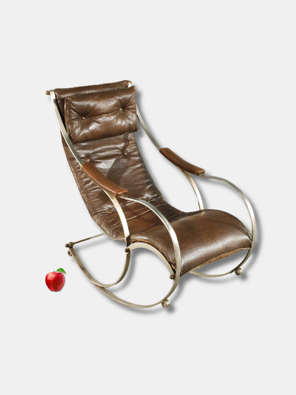 A Victorian metal rocking chair with a curved strap steel frame, brown button-tufted leather upholstery, padded armrests, and an integrated headrest cushion.