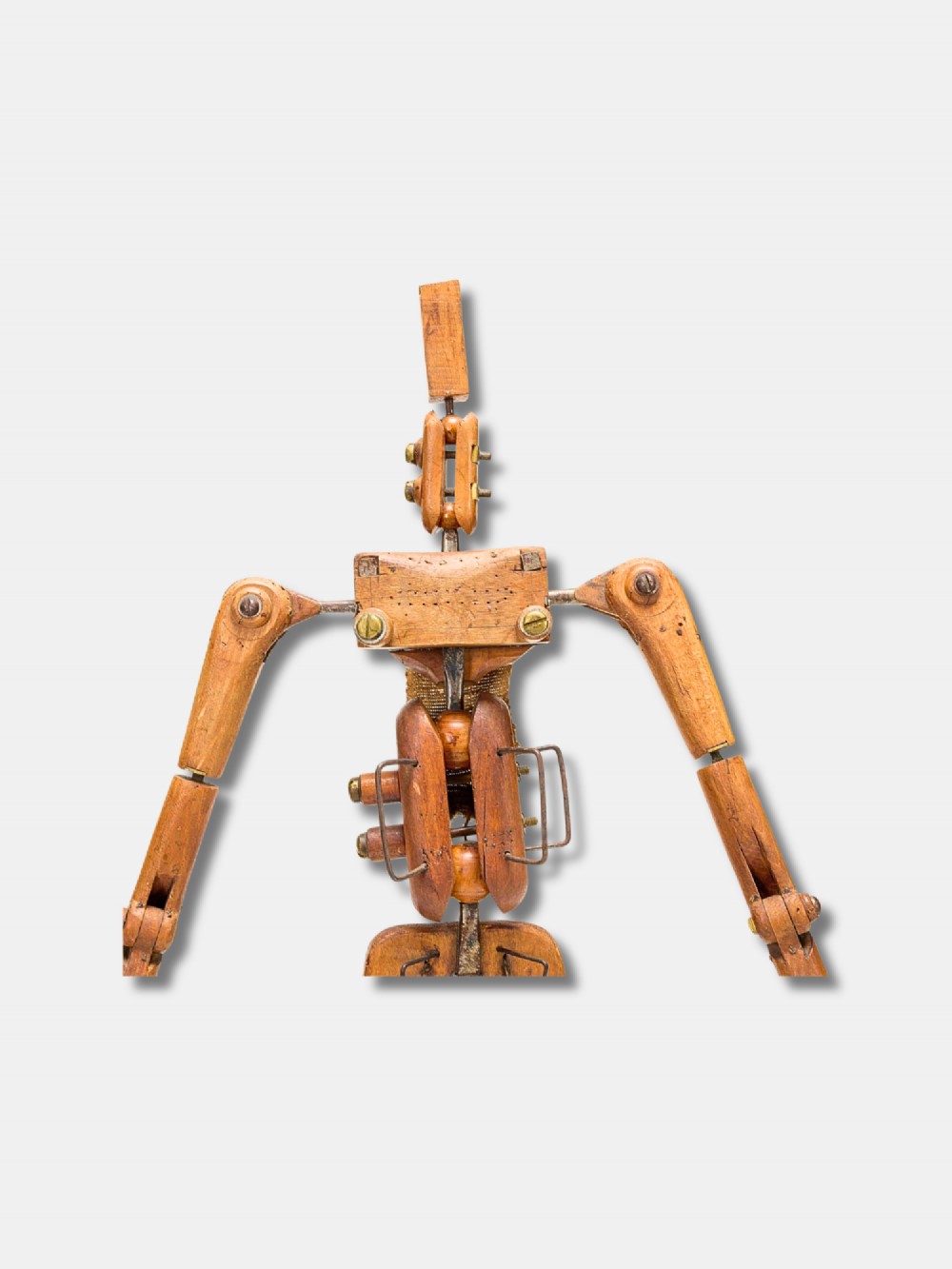 A life-size 18th-century French articulated wooden lay figure with exposed jointed limbs mounted on a dark metal stand. View IV