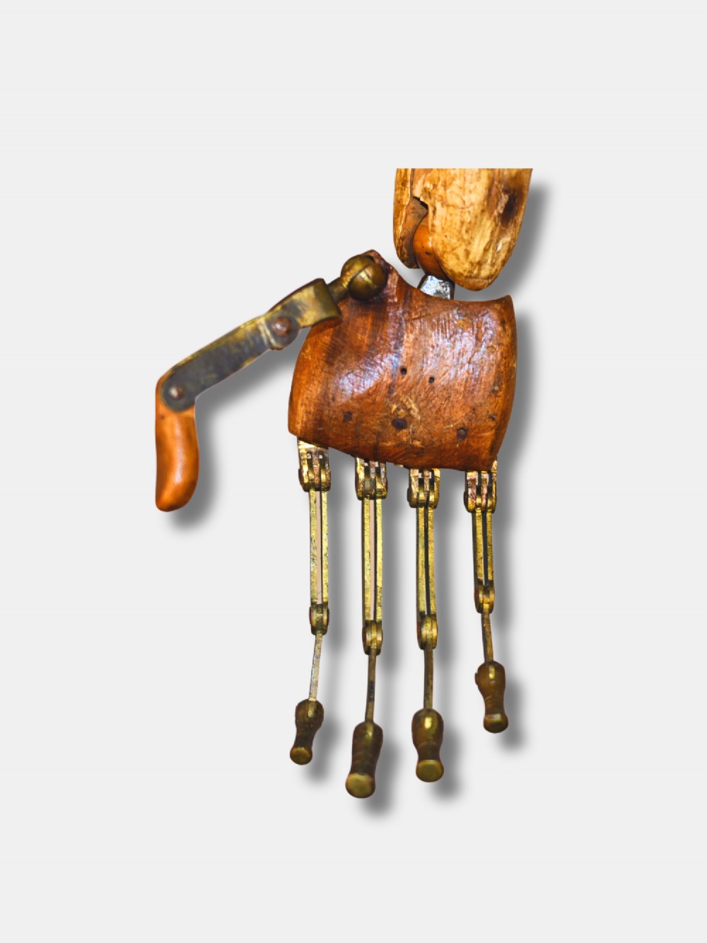 A life-size 18th-century French articulated wooden lay figure with exposed jointed limbs mounted on a dark metal stand. View V