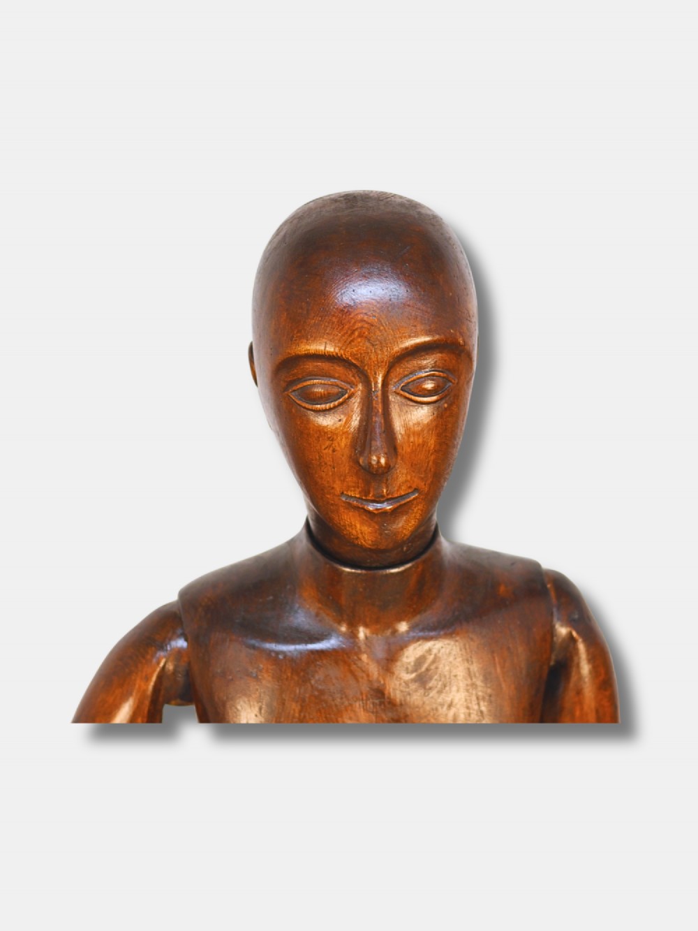 A nineteenth-century French life-size wooden articulated lay figure with hand-carved facial features and fully jointed limbs. View II