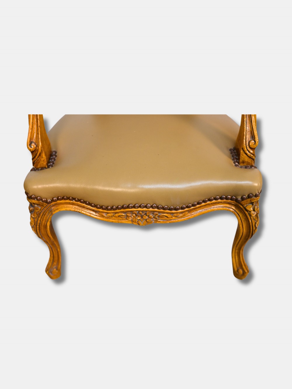 A pair of 19th-century French child-sized walnut armchairs featuring carved frames, woven cane backrests, cabriole legs, and olive green leather seats. View III