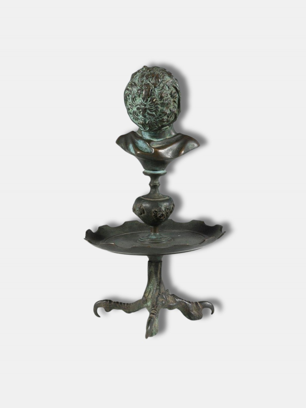 An antique circa 1820 Italian patinated bronze oil lamp featuring a tripod eagle claw base, a central circular tray, and a top finial shaped as a bust of a satyr. View III