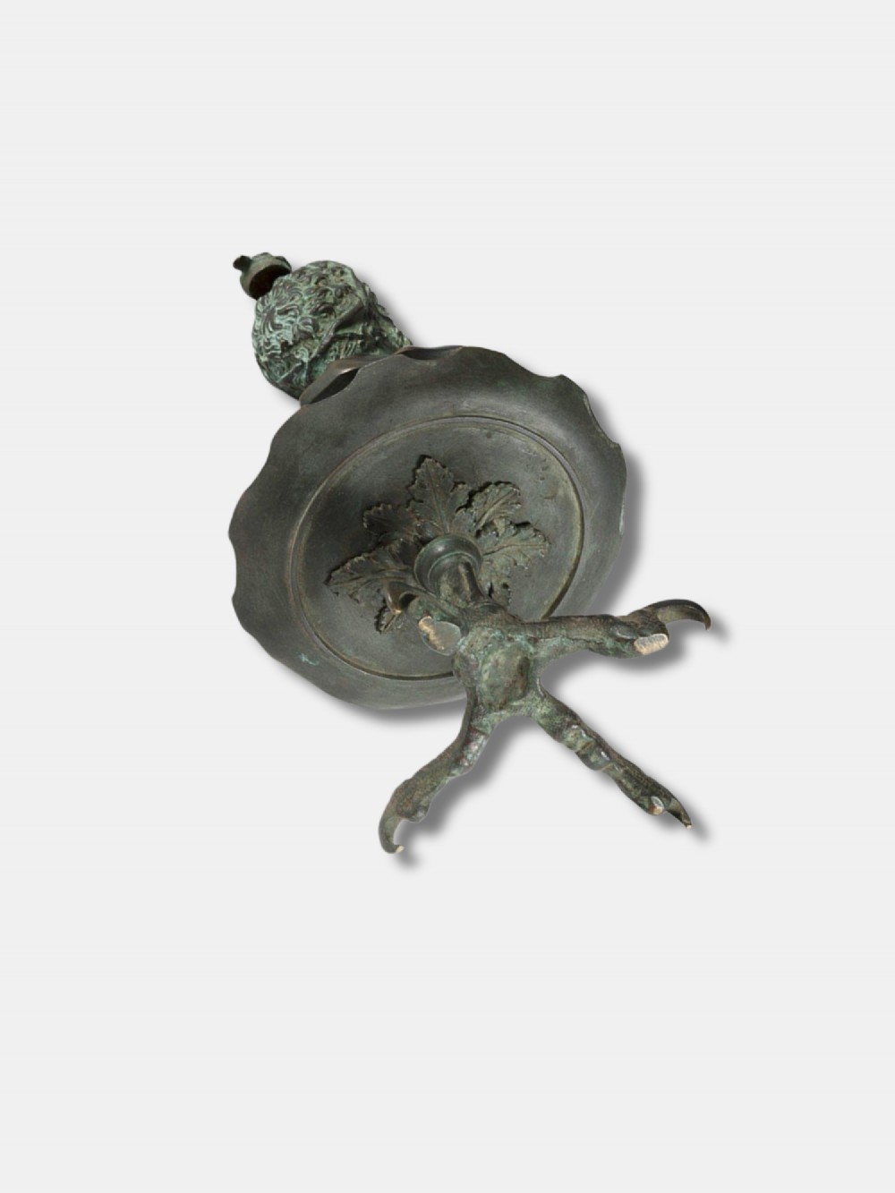 An antique circa 1820 Italian patinated bronze oil lamp featuring a tripod eagle claw base, a central circular tray, and a top finial shaped as a bust of a satyr. View IV