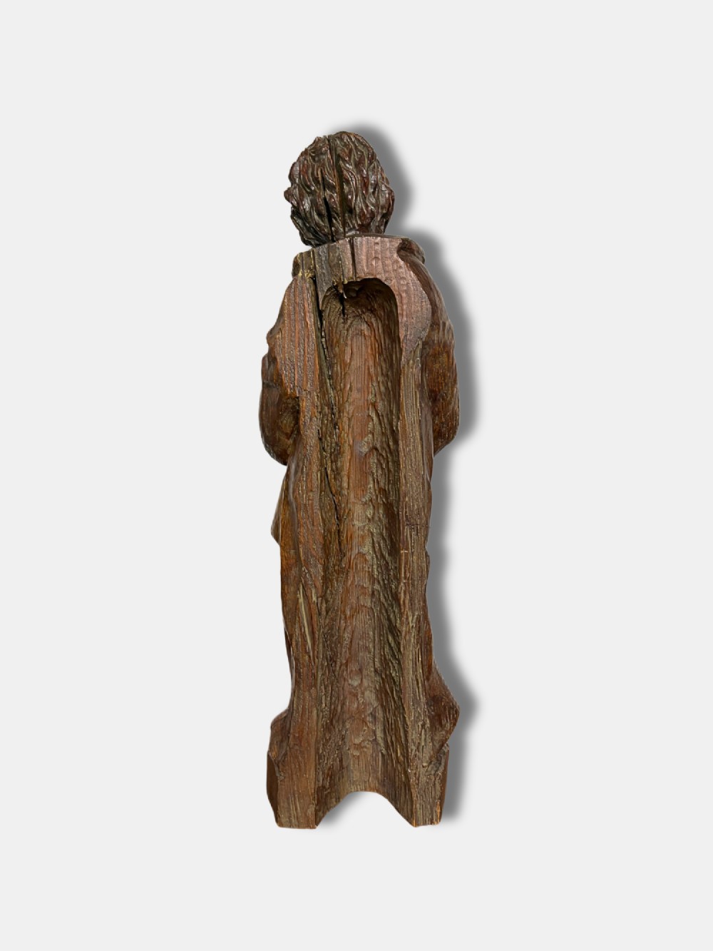 An 18th-century French carved wood statue depicting Saint Peter holding a book and keys. View IV