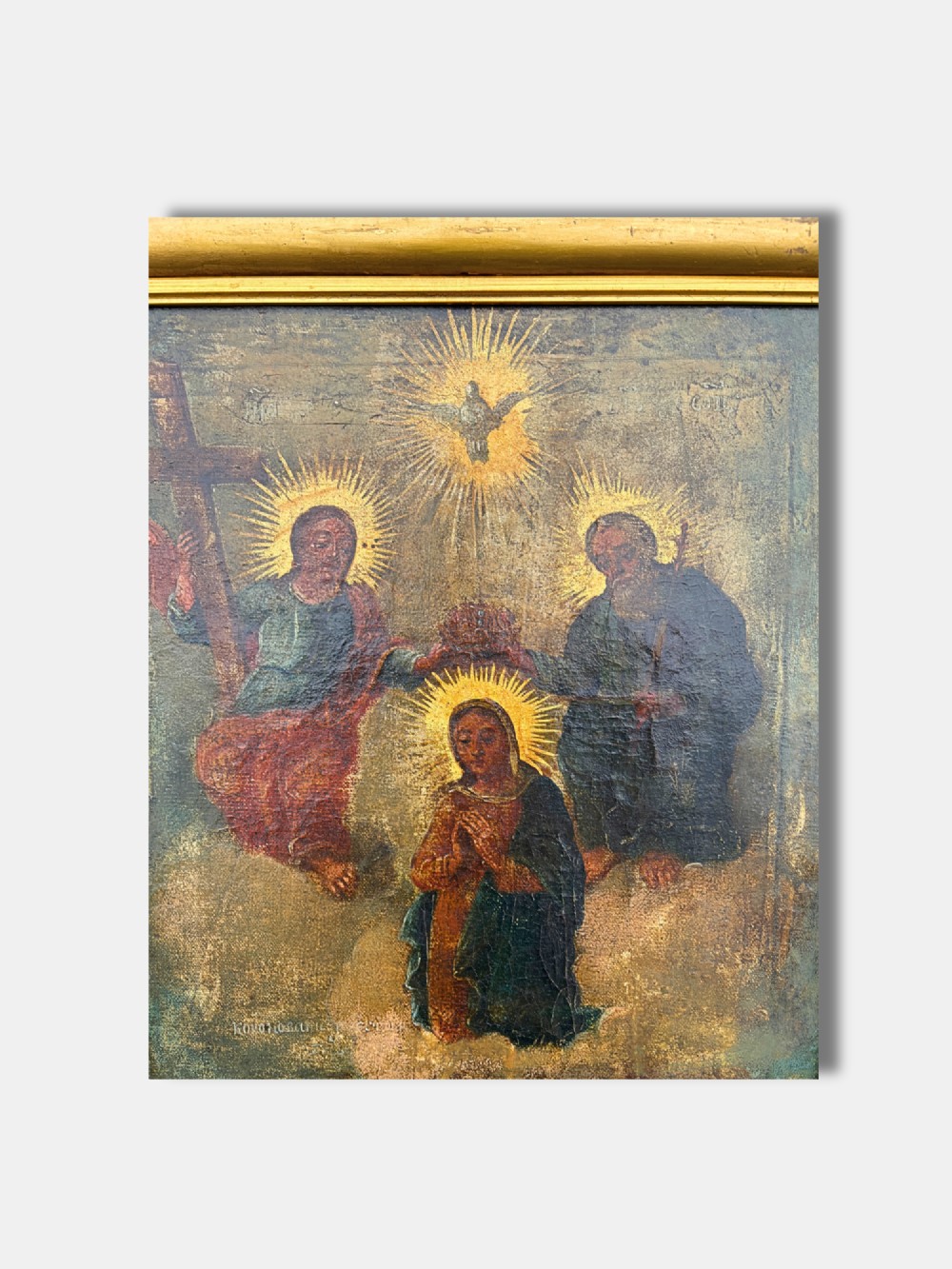 An antique Russian quadripartite icon painting featuring four distinct devotional panels framed in a gilded wood border. View IV