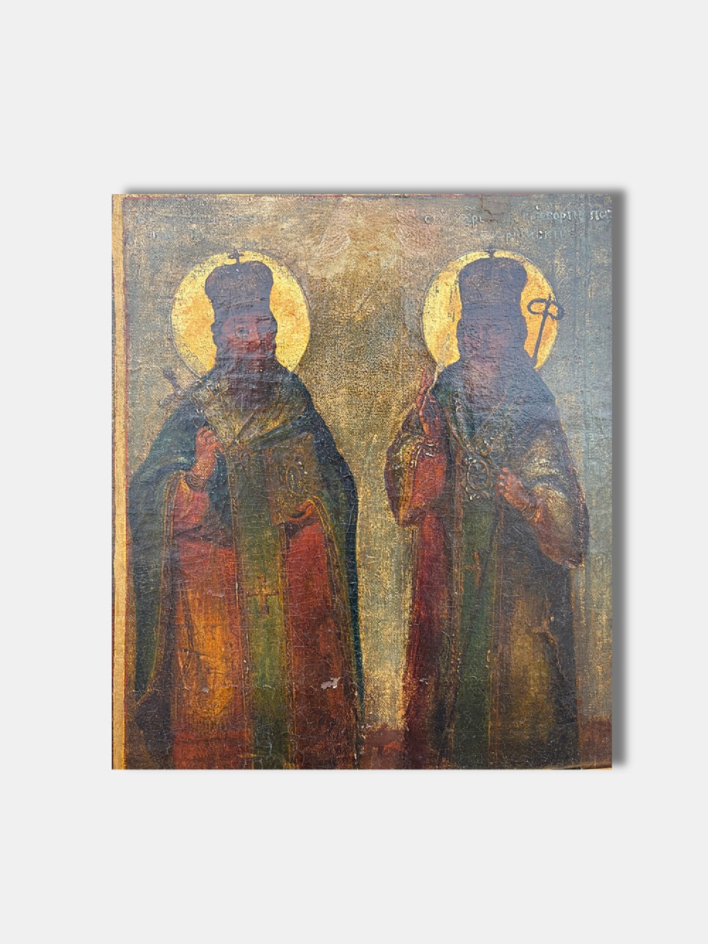 An antique Russian quadripartite icon painting featuring four distinct devotional panels framed in a gilded wood border. View V