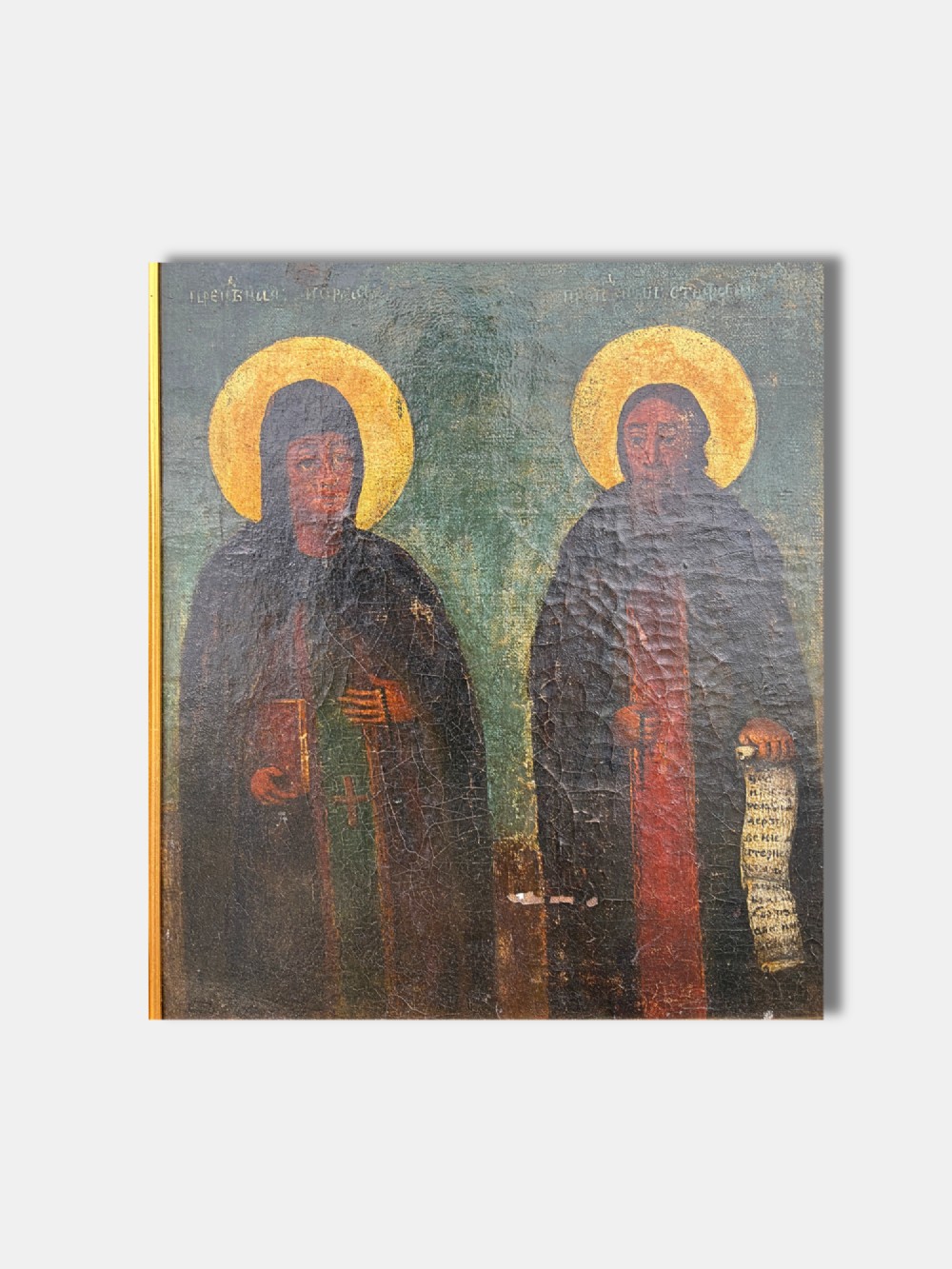 An antique Russian quadripartite icon painting featuring four distinct devotional panels framed in a gilded wood border. View VI