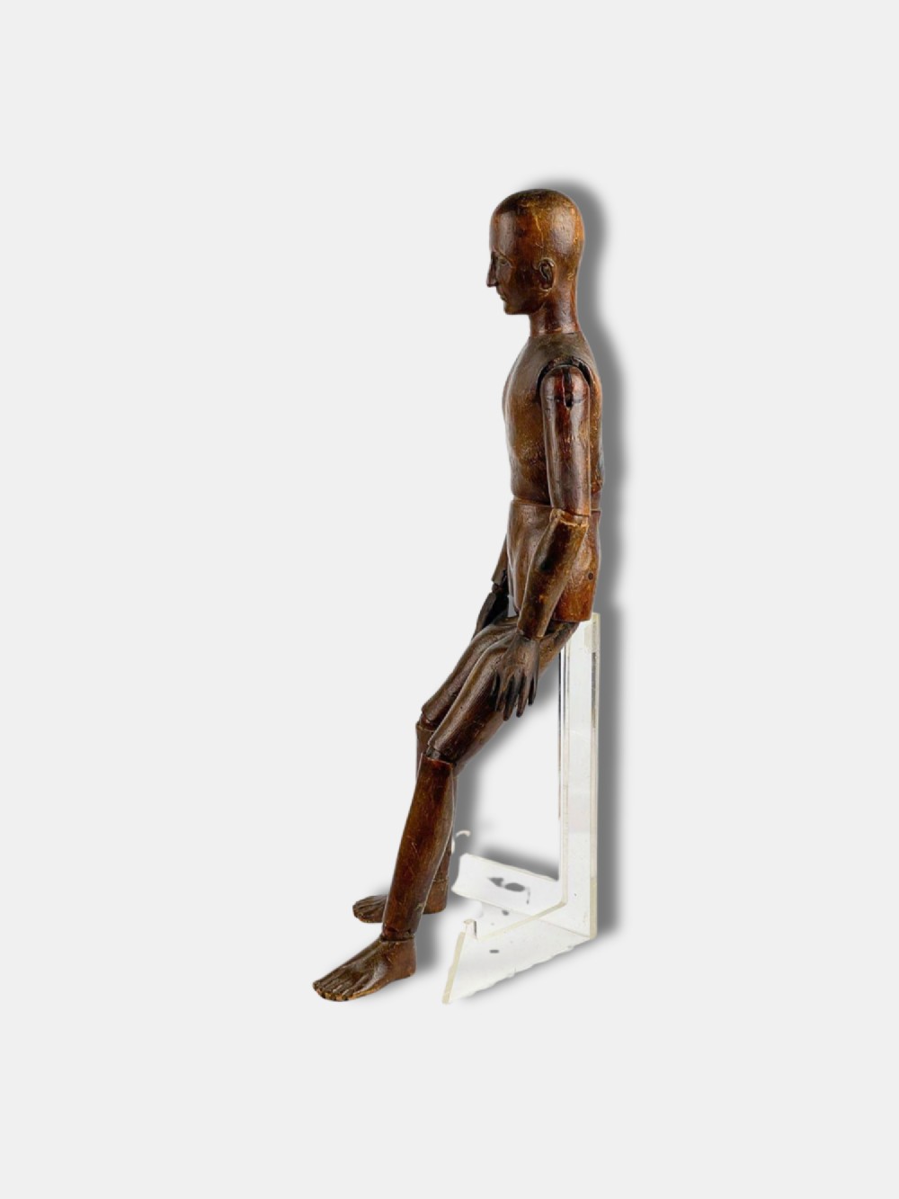 A French carved wooden articulated artist lay figure with a warm brown finish and posable limbs. View III