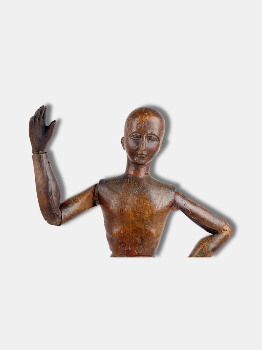 A French carved wooden articulated artist lay figure with a warm brown finish and posable limbs. View IV
