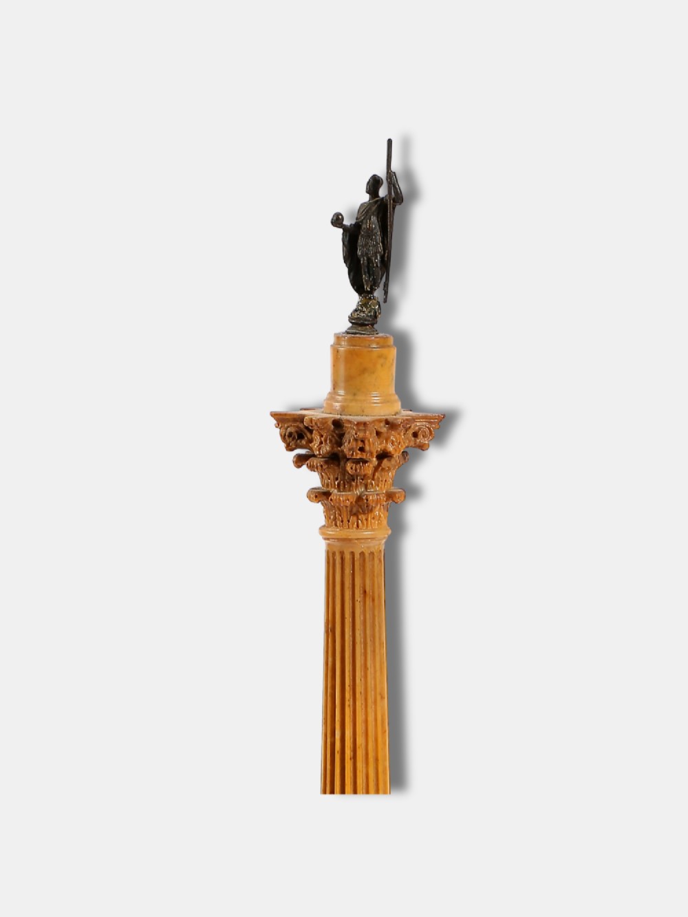 A detailed miniature architectural model of the Column of Phocas carved from yellow Giallo Antico marble with a small bronze figure atop, set upon a stepped square base. View IV