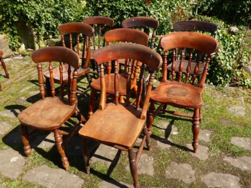 A Harlequin Set of 8 Victorian Kitchen Chairs