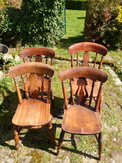 A Harlequin Set of 4 Victorian Kitchen Chairs