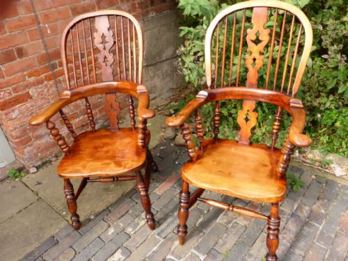 A Near Pair of Victorian Broad Arm Windsor Armchairs