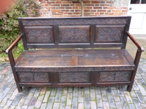 Early 18th Century Carved Oak Box Settle
